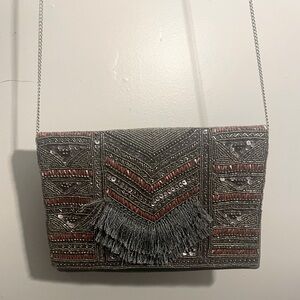 Unbranded gray& bronze fringed purse.